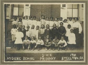 Students and teacher in the primary grades at the Hygienic School, 1910. Click for a larger image.