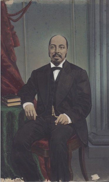 Colorized photographic image of a seated distinguished looking African American man, circa 1880s.