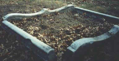 Grave plot edged in granite curbing