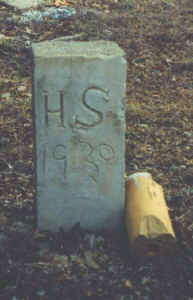 A small homemade grave marker