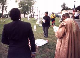 Ms. Latonya Randall, great, great,  grandniece of Thomas Morris Chester, addresses the crowd. Click for a larger image.