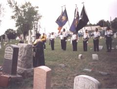 Members of the American Legion Honor Guard present the colors.  Click for a larger image.