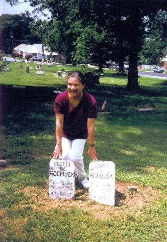 The author at the gravesite of her grandparents, George and Jennie Roebuck, in Midland Cemetery.