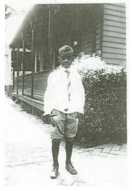 James Roebuck standing outside of the Roebuck ancestral home in Steelton, 257 Adams Street.  Photo courtesy of Beula R. Mack.