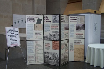 African American history exhibits set up during event.