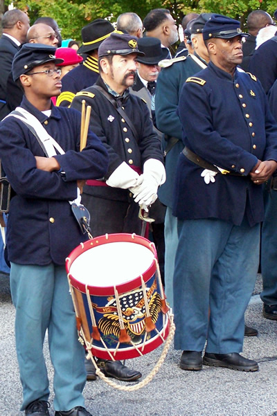 a re-enactor in the 2010 commemorative parade.